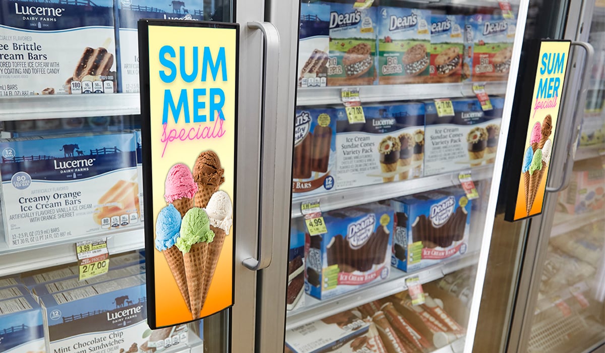 Two custom cooler retail signage promoting summer deals at the grocery store